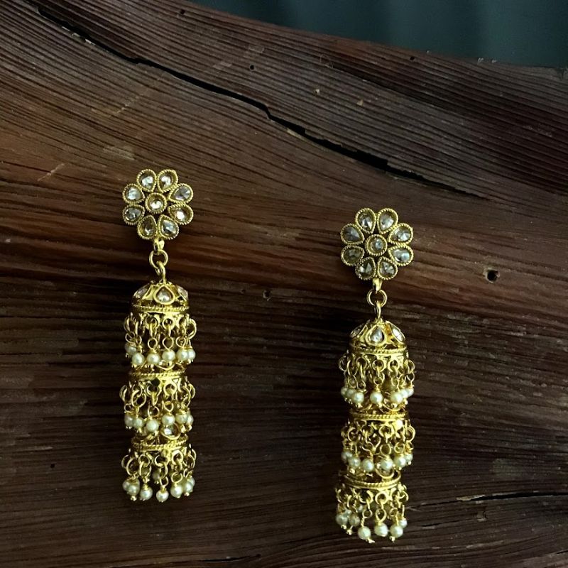 Face Look Of Beautiful Three Layer Gold Look Jhumki