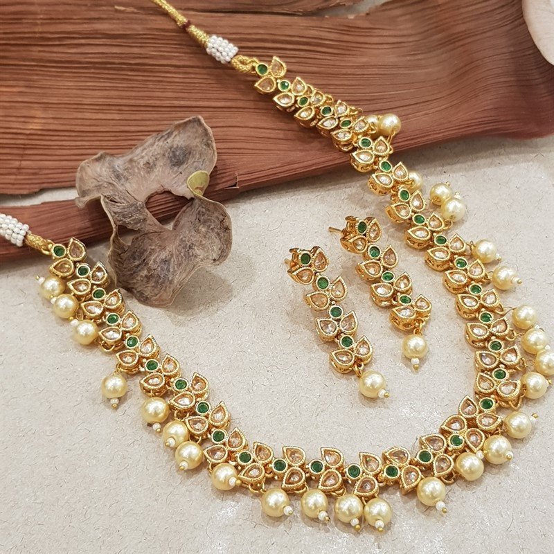 Round Neck Light Polki Necklace Set With Green Stones And Pearl-Matching Earrings